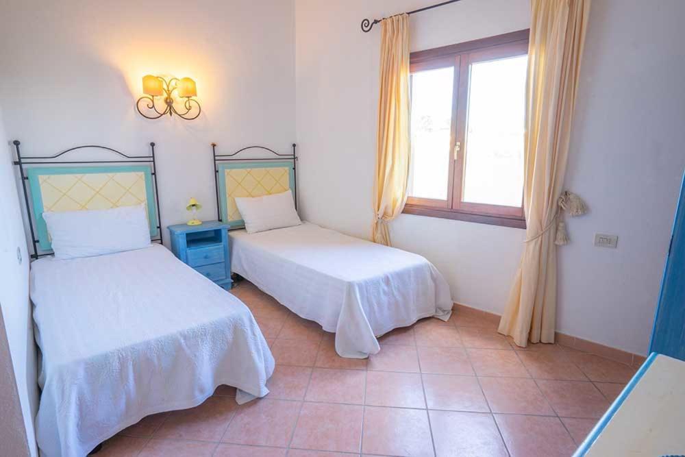 Residence Baia Sant Anna Con Piscina Tanaunella Extérieur photo