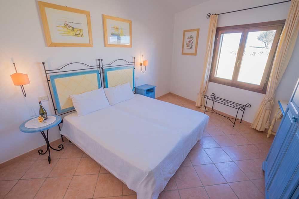 Residence Baia Sant Anna Con Piscina Tanaunella Extérieur photo